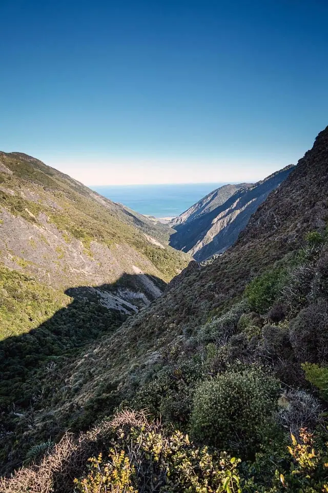 View down a valley to the sea