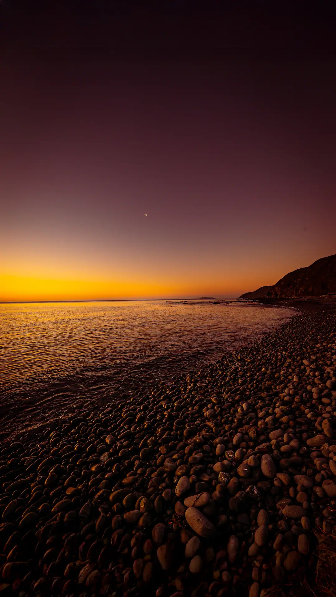 Pebbles on the foreshore of the Makara Walkway at sunset 