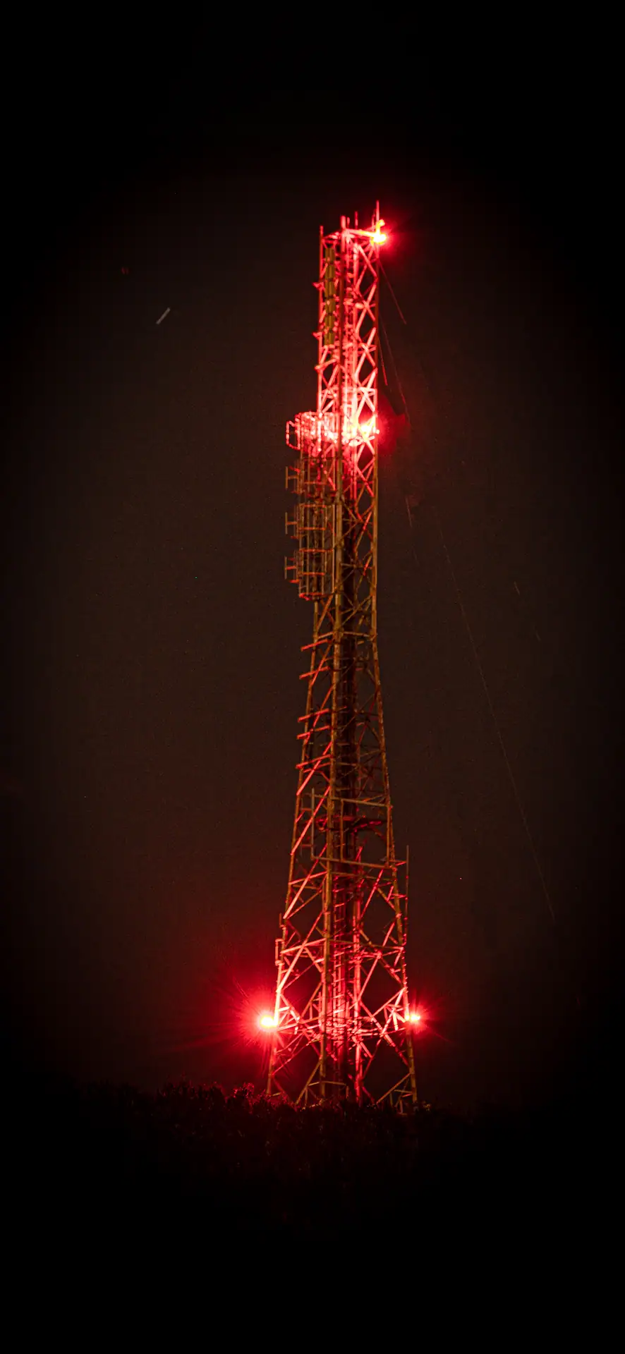  The telecommunications tower with red navigation lights near the summit of Kaukau 