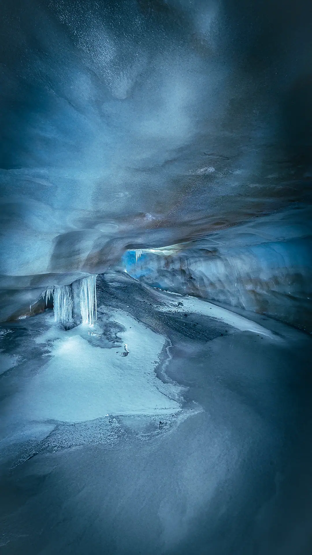  The blue ice and stalactites in a tunnel under the Sunnit Plateau Glacier, Mt Ruapehu, Tongariro National Park 
