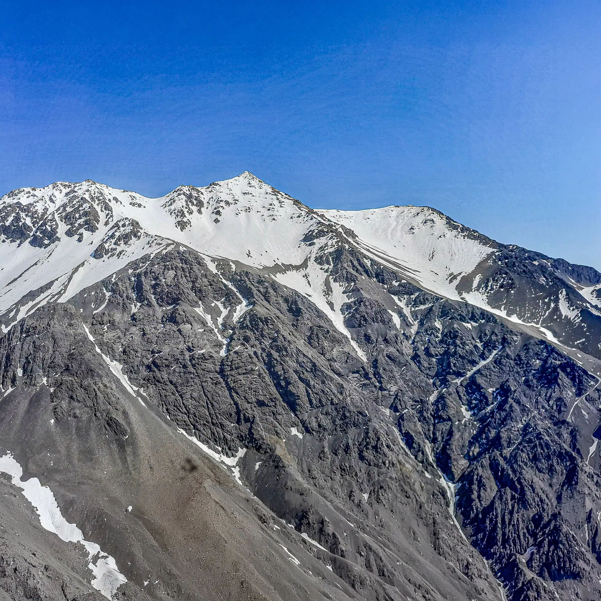 Te Ao Whekere viewed from low on the approach ridge - the peak is right skyline