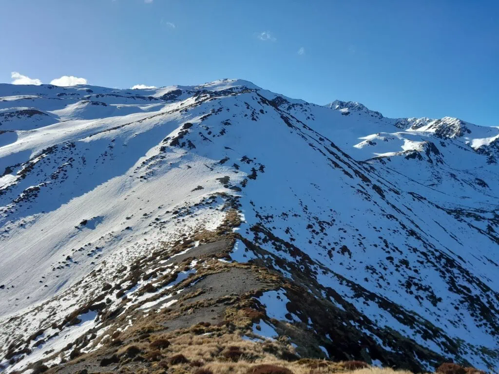 A steep snow covered slope on Mt Princess