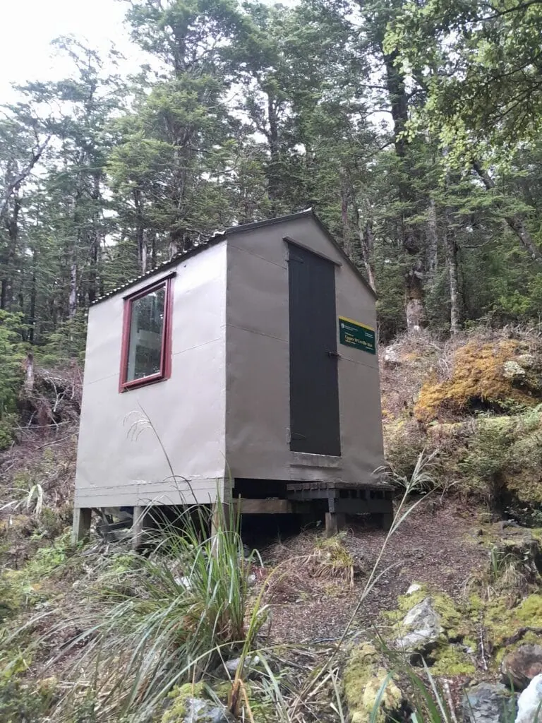 A small and basic Upper D'Urville Hut in the D'Urville Valley