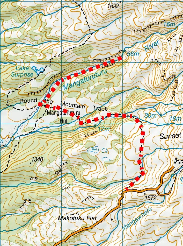 Map showing the route to the massive 56-meter hidden waterfall near Mangaturuturu Hut, cascading down volcanic rock faces into the Mangaturuturu River