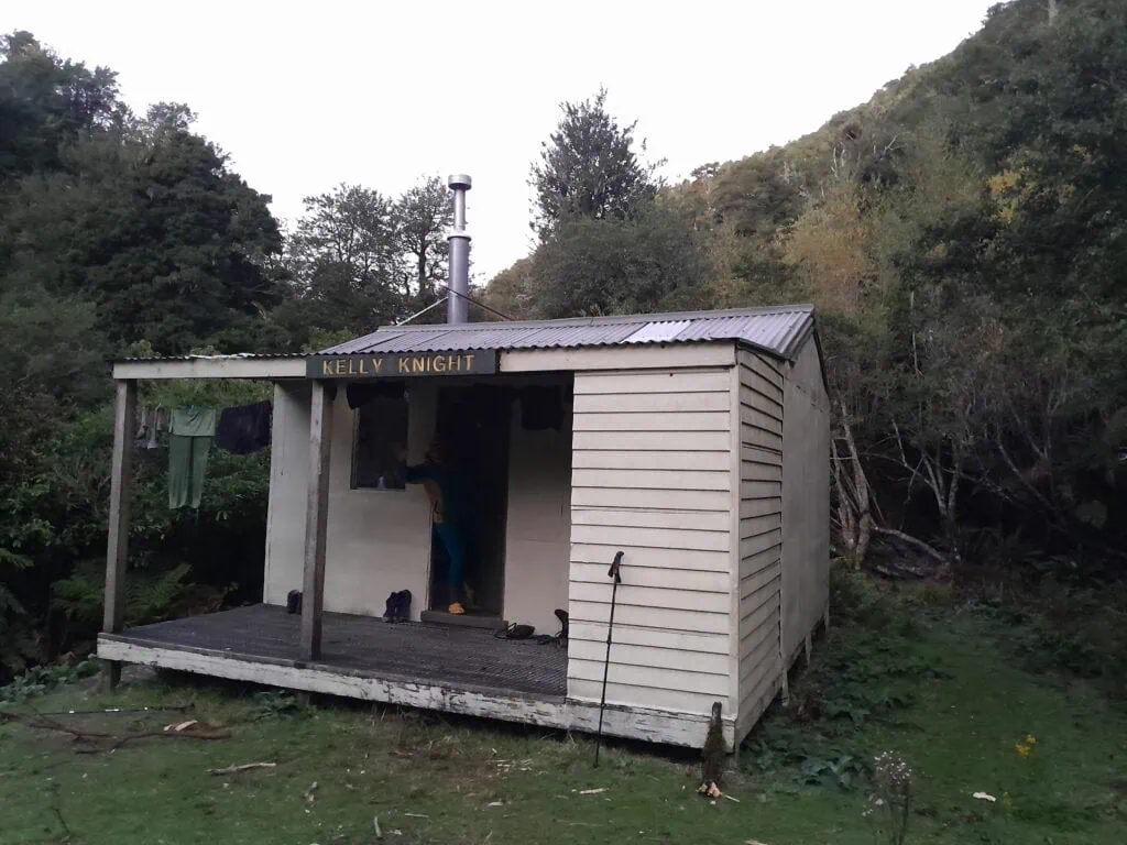 Kelly Knight Hut in a native bush clearing in the Ruahine Range