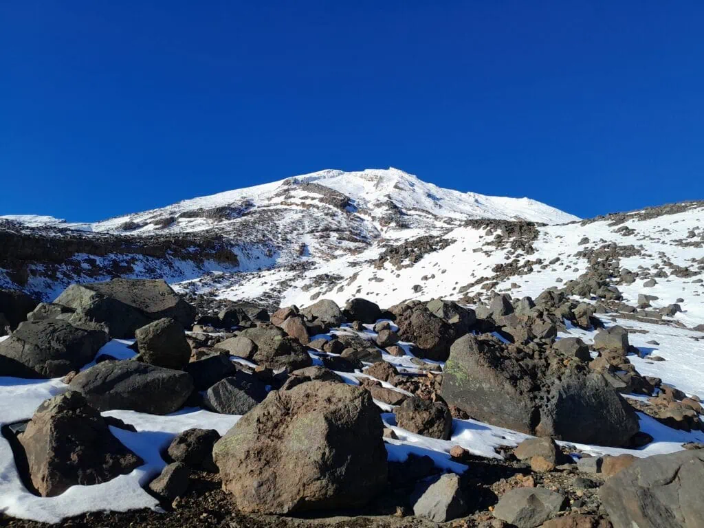 Mt Ruapehu summit ridge showing the sharp spike of Te Ātaahua (Shark's Tooth) from Turoa skifield, Tongariro National Park