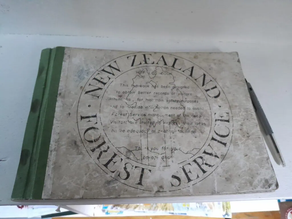 An old, historic New Zealand Forest Service hut log book in Lower Salmon Creek Bivvy from 1985, Mt Oxford Forest, Canterbury
