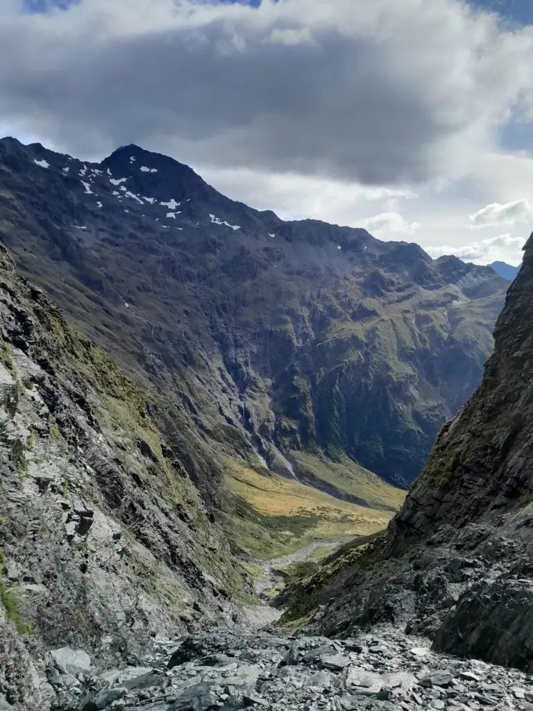 Dramatic alpine view looking down a steep rocky gorge into the spectacular Cirque Basin at the head of North Temple Valley, Ruataniwha Conservation Park