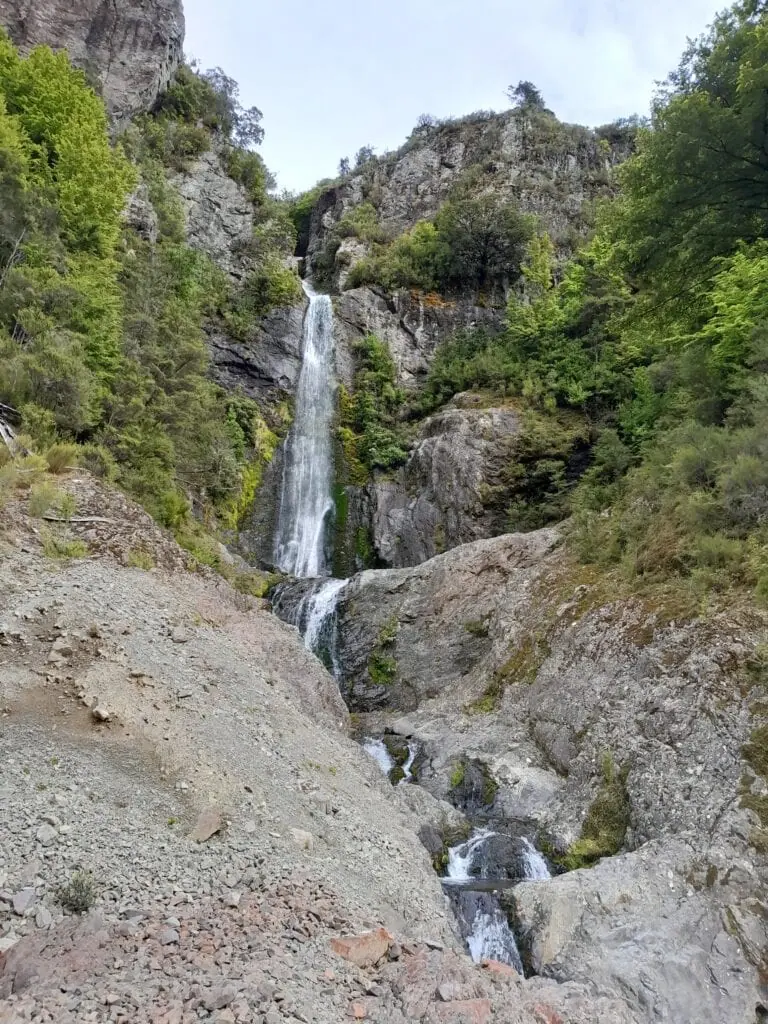 Scenic multi-tiered waterfall cascading down a rocky gorge along the Gosling Stream tramping route., Marlborough