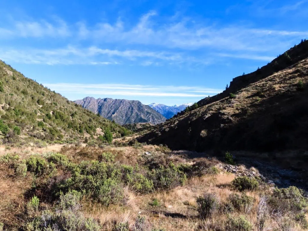 View looking down Station Creek valley toward mountain ranges along the Wye Route